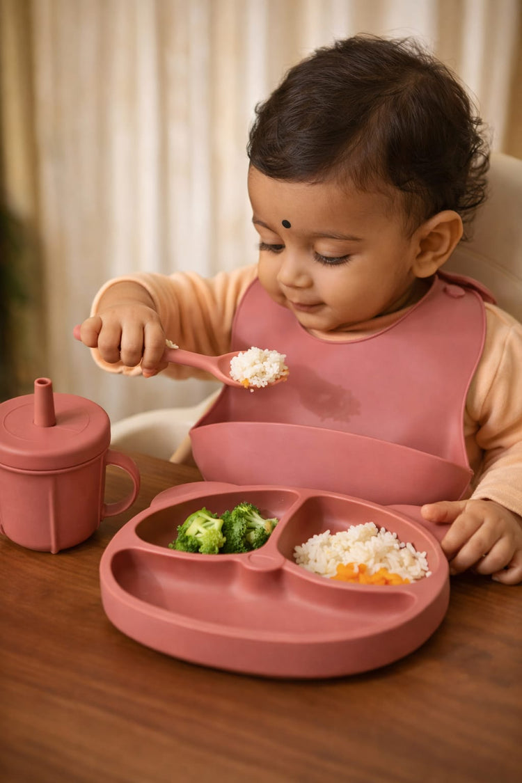 Dhootha™ 6-in-1 Silicone Baby Feeding Set with Suction Plate, Bowl, Cup, Bib, Spoon & Fork | BPA-Free Self Feeding Essentials for Babies 6–12 Months | Dark Pink